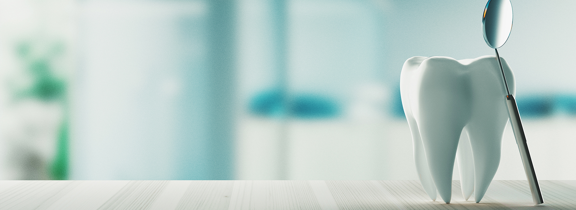 The image shows a dental chair with a toothbrush on it, set against a blurred background that suggests a medical office environment.